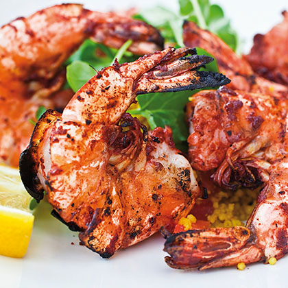 Grilled shrimp with tomato, cucumber and onion salsa